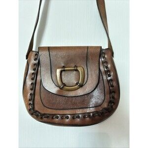 The Cobblers Bench Vintage 1970’s HAND TOOLED Hard cow hide leather Bag Hippie